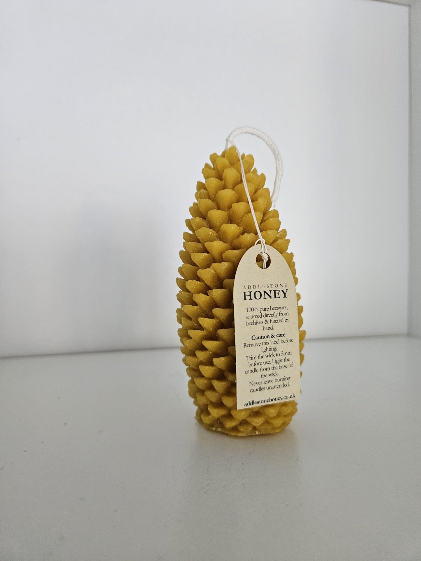 Handmade pure beeswax pinecone candle, 15hr burn time, 11.5 x 5.5cm - Addlestone honey