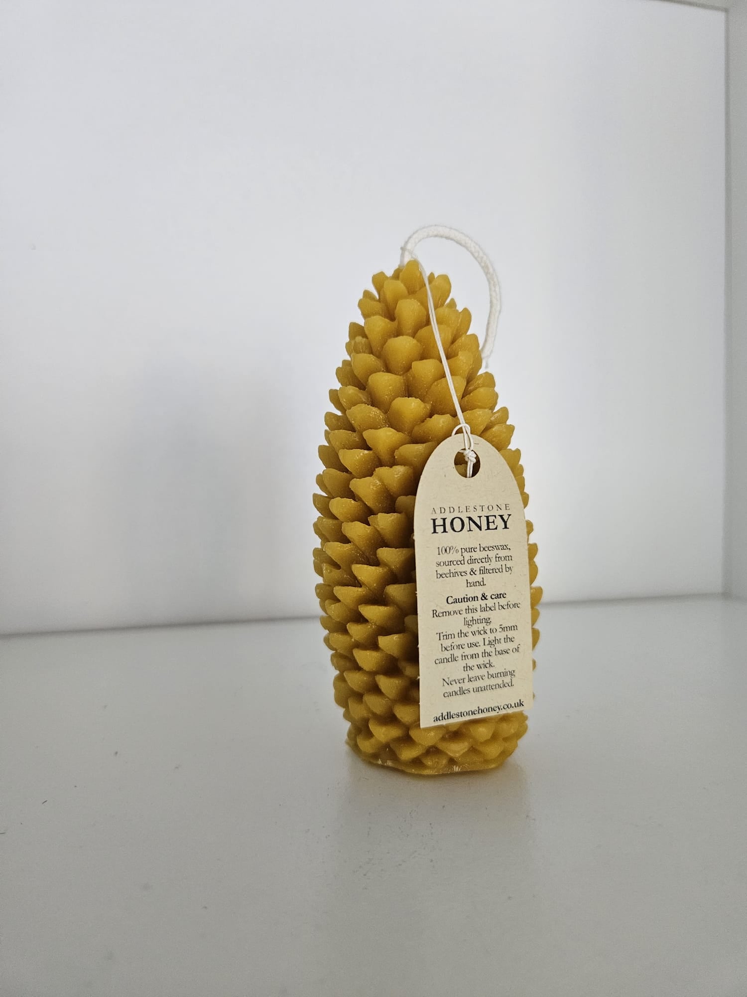 Handmade pure beeswax pinecone candle, 15hr burn time, 11.5 x 5.5cm - Addlestone honey