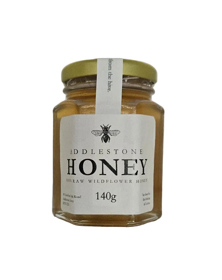 140 gram jar of pure raw wildflower honey