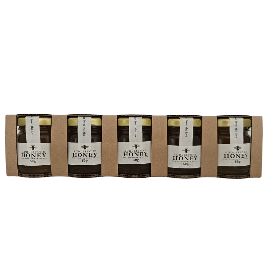 5 mini jars of raw honey