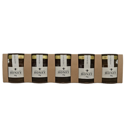 5 mini jars of raw honey