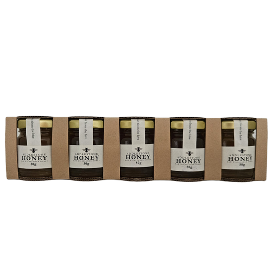 5 mini jars of raw honey