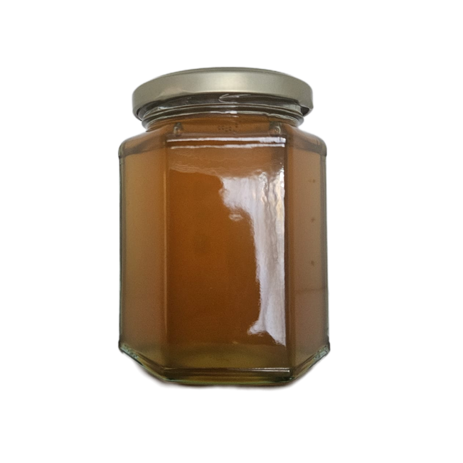 Unlabelled jar of raw honey