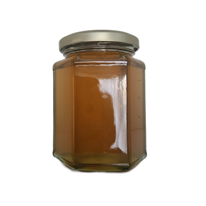 Unlabelled jar of raw honey
